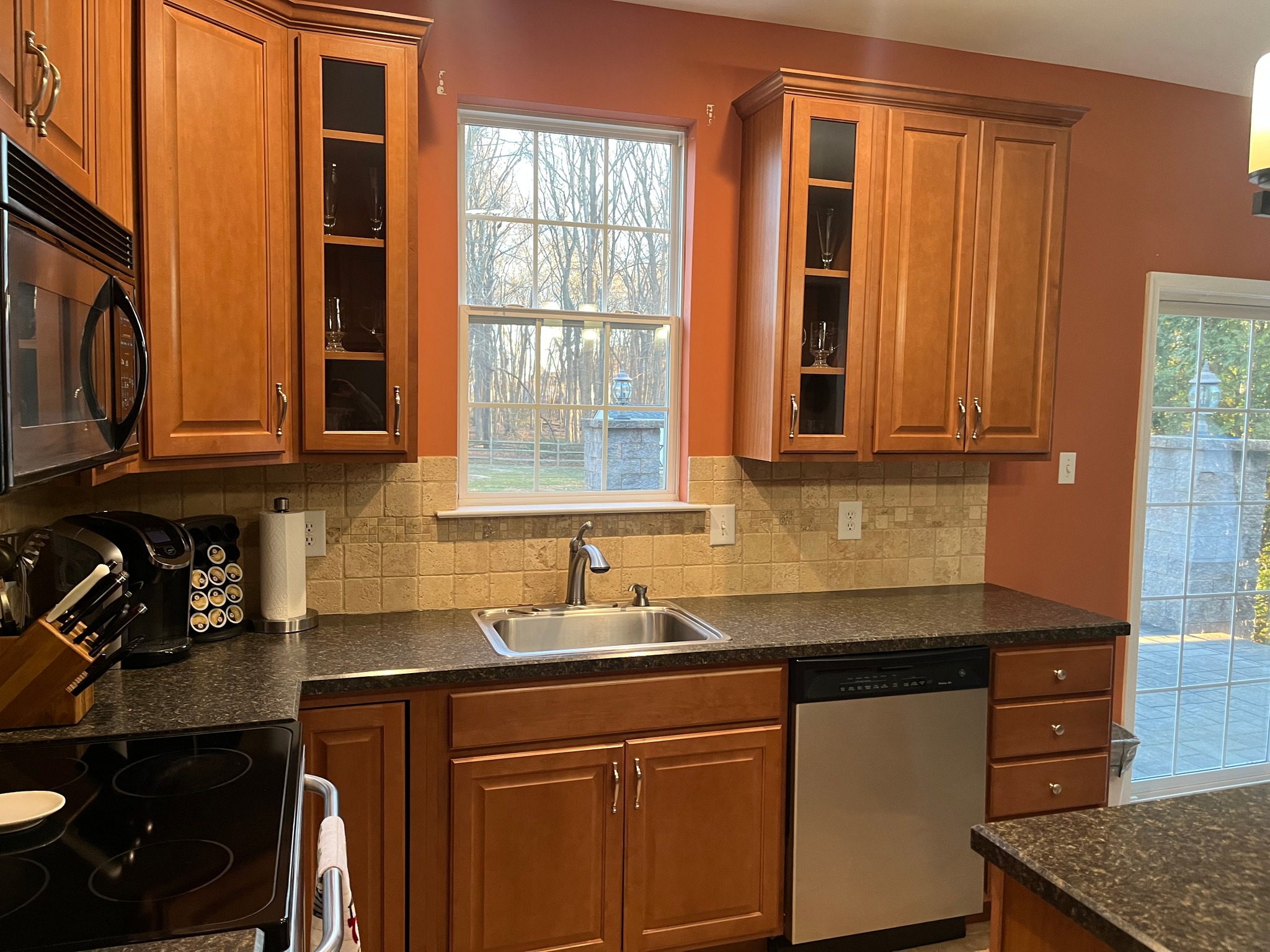 Professionally painted kitchen before and after Spinelli Signs and Painting